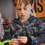 Lab student focused on the project.