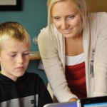 Instructor offering support.