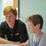 Two students working together.